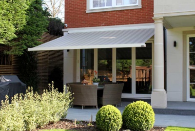 Enhance, protect and prolong the use of your terrace with a stylish motorised patio awning